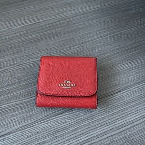 Coach wallet in red, used